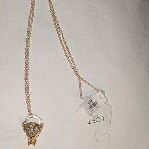 Loft gold tone chain Necklace with gem embellished good luck elephant pendant